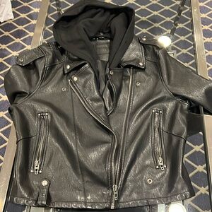 Leather jacket with bulky in hoodie sweatshirt